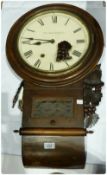 A mahogany drop dial wall clock, circular enamel dial with Roman numerals, stamped "New Haven