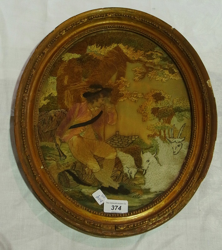 A Georgian silkwork needle thread picture, shepherd looing after sheep, in oval frame
