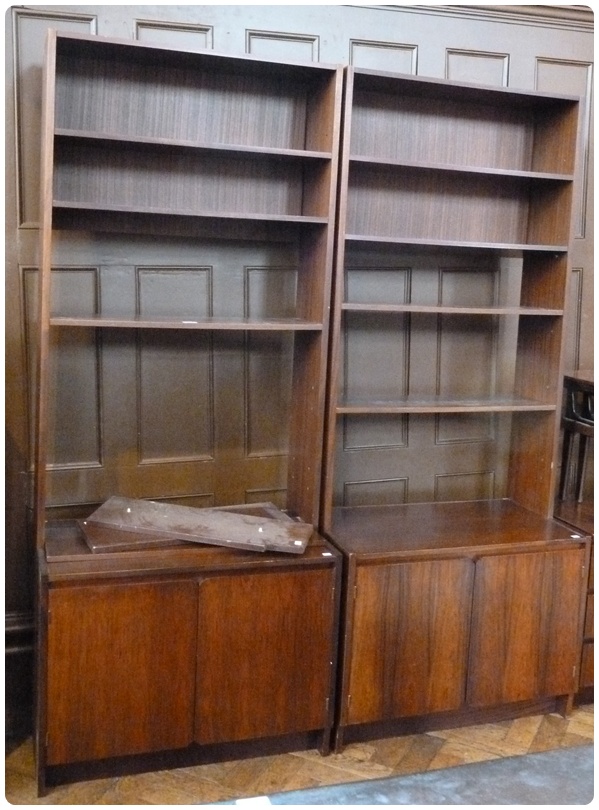 A. H. McIntosh and Co Ltd, Scotland, pair rosewood display units, shelves above, two double