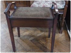 20th century stained mahogany piano stool with hinged upholstered lid on tapering legs, 51cm wide