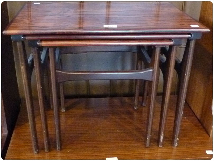 1970s Danish style rosewood nest of three tables, on tapering supports, 58cm wide