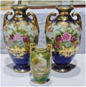 Pair Noritake porcelain vases, ovoid and two-handled, painted with roses autour and having blue