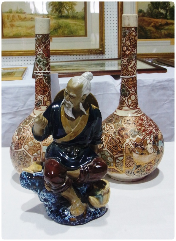 Pair Japanese Satsuma bottle vases, ball and shaft shape, decorated with figures and brocade work,