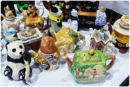 Fourteen various novelty teapots, including:- one with hunting scene, Portmeirion limited edition