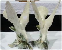 Pair Lladro Daisa models of doves, alighting on floral branch