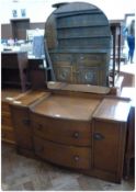 Early 20th century dressing chest, mirror above two long drawers, flanked by cupboards, with brass