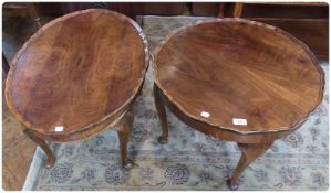 Two modern walnut occasional tables, with wavy border on cabriole legs