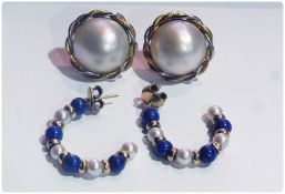 Pair gold coloured metal pearl and lapis half hoop earrings and pair large pearl earrings within