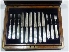 Set of twelve silver dessert knives and forks, with mother-of-pearl handles, Sheffield 1898,