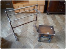 An oak box top stool on turned legs, together with a Victorian mahogany towel rail (2)