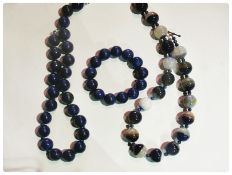Polished lapis bead necklace and bracelet and another blue quartz and smaller lapis bead necklace