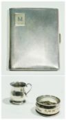 George V silver cigarette case, with engine-turned decoration and sprung hinge, London 1933, a