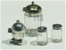 Pair small glass salt and pepper pots, the covers marked sterling silver, together with mustard