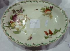18th century Chelsea porcelain plate, painted with fruits within a brown and green feather moulded