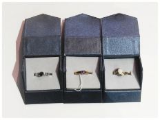 9ct gold and opal stone ring, cased, 9ct gold and amethyst ring, and another (3)