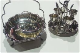 Silver plated bread basket, breakfast set, and another basket with handle (3)