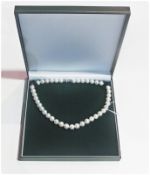 String of freshwater pearl necklaces, 12-13mm, with 18ct plated mount