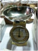 A typhoon weigh scale, cream enamel face with bowl and measuring dial