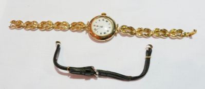 Twentieth century lady's 15ct rose gold watch, with enameled dial, on a 14ct gold reef knot