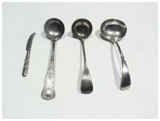 Three assorted silver plated ladles and a tea knife (4)