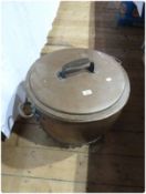 A very large copper boiling bowl and lid with twin handles