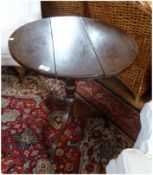 Old oak circular top tripod table, with turned pedestal, on outswept legs, 60cm diameter