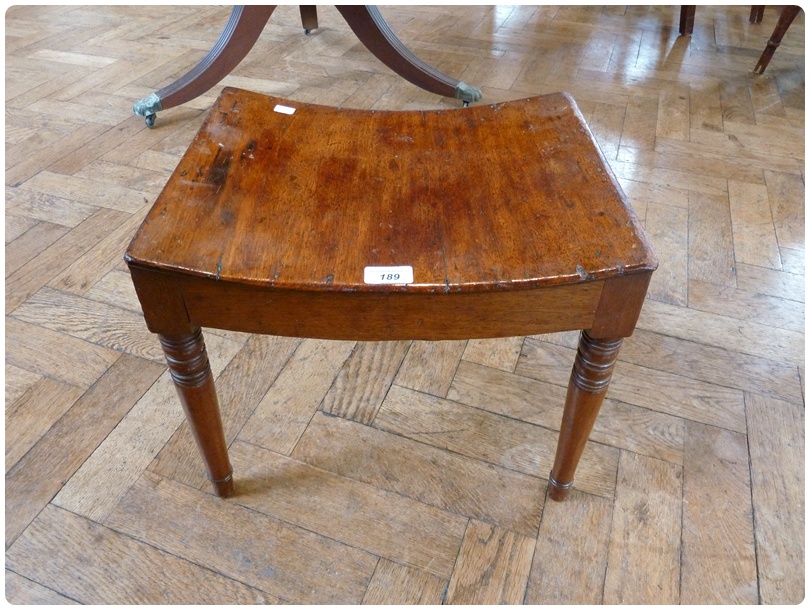 Nineteenth century mahogany rectangular stool, with dished seat, on ring turned tapering legs, width