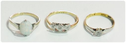 Twentieth century gold and three-stone diamond ring, in triple heart setting, another small