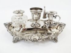 A Victorian silver inkstand, with glass silver-capped inkwell, silver chamberstick with Sheffield