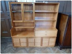 Modern hardwood wall unit comprising a glazed cupboard, open shelves and two drawers with three