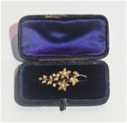 Gold-coloured and seed pearl floral spray brooch
