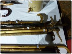 Five various walking sticks, three with horn handles, carved (5)