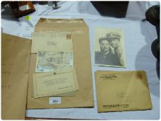 A signed photograph of Dorothy Lamour in original envelope dated 1944 and a signed photograph of