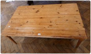Pine rectangular top coffee table, with plain frieze, and ring turned tapering legs, 135cm long