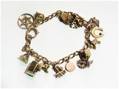 9ct gold charm bracelet and three loose charms