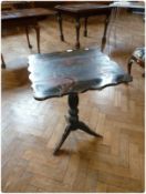 Nineteenth century square top chinoiserie lacquer side table, with wavy edge, on baluster turned