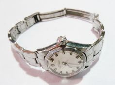 Lady's stainless steel Rolex watch, with champagne-coloured face, in original box