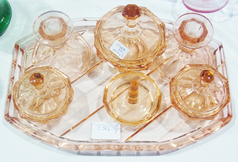 Art Deco peach-coloured glass dressing table set, and 1950s pink and white glass bowls, with