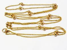 15ct gold long ball and chain necklace, 25.6g approx.