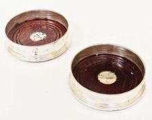 Pair silverplate decanter coasters, with turned wooden bases and silver bosses, Birmingham 1969,