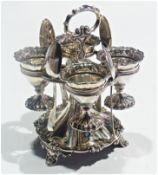 William IV silver four egg cup stand, with spreading circular base to scroll feet, London 1830, with