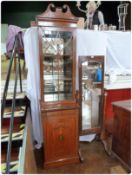 Edwardian painted satinwood Sheraton revival glazed secretaire bookcase, with swan-neck pediment,