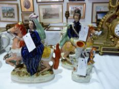 A Staffordshire pottery figure "Empress of France" and another "Louis Napoleon" and a