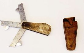 Horn and brass-set folding blood letting knives, in leather carrying case