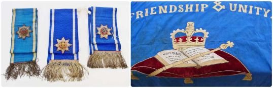 Ceremonial sashes, possibly Masonic and a large religious banner in blue and yellow again possibly