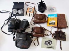 Quantity cameras, including Kodak Autosnap Retinet, Autographic Brownie, Practica Bensini Comet