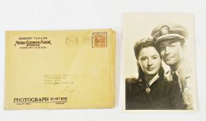 Signed photograph of Barbara Stanwyck and Robert Taylor in original envelope dated 1946