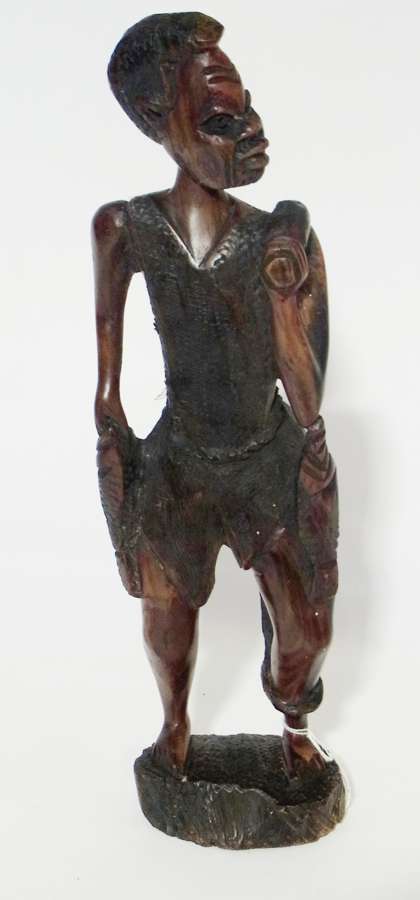 Carved African hardwood figure of fisherman, 41cm