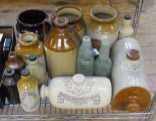 Two hot water bottles, Stoneware jars and other items