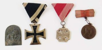 Three WWI German medals and an Italian offensive 1917-18 badge
